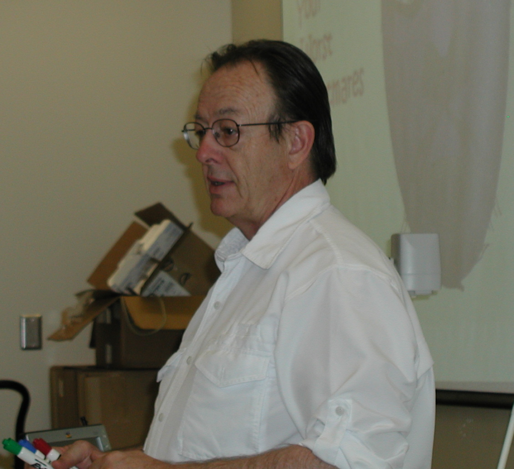 Claude Whitmyer leading a course in video production and video conferencing for educational purposes.